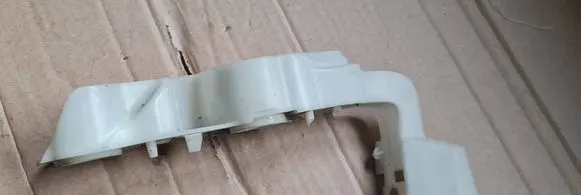 Front bumper mounting bracket
