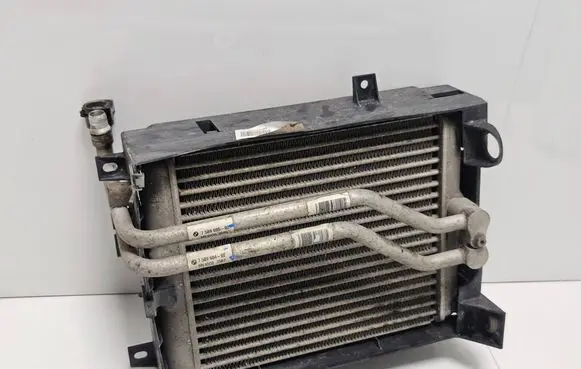 BMW X5M E70 Engine oil radiator 7589518