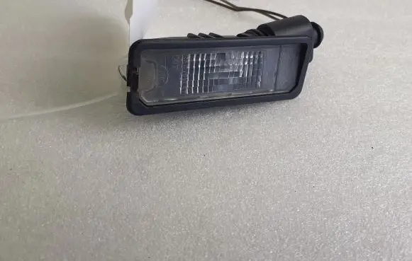 Porsche Cayenne (92A) Number plate light 1JO973702 1K8943021