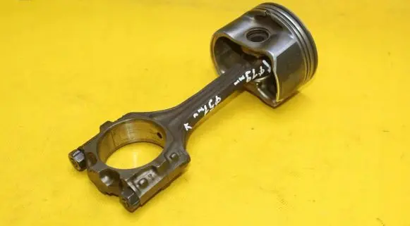 Volkswagen Golf IV Piston with connecting rod 06J