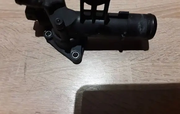 Thermostat/thermostat housing