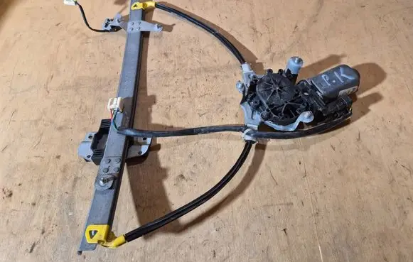Mazda 323 Front door window regulator with motor 114019AVG