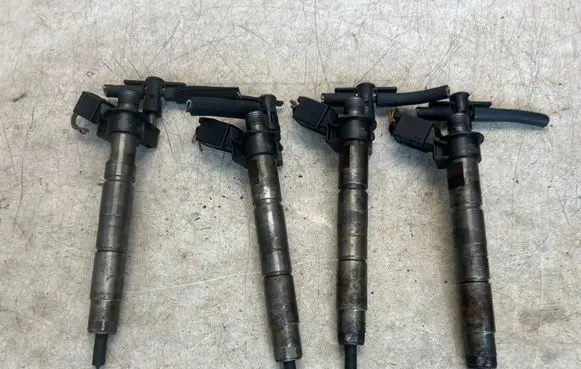 BMW X1 E84 Fuel injectors set 0445116024 780542801 7805428
