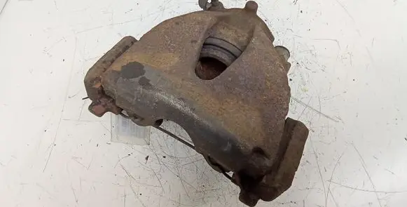 Opel Astra G Front brake caliper 