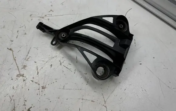 Tesla Model X A/C compressor mount bracket 162140600C