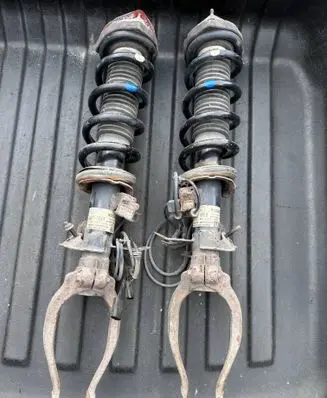 Infiniti FX Front shock absorber with coil spring 561111CF0D 442400004556 561101CF0D