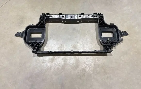 Radiator support slam panel