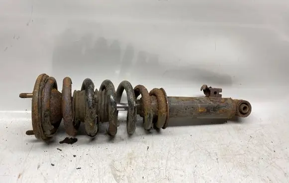 Mitsubishi L200 Front shock absorber with coil spring 