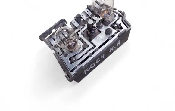 Tail light bulb cover holder
