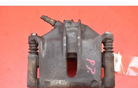 Peugeot 208 I Front brake caliper