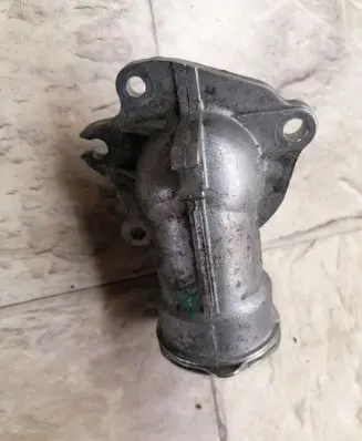 Thermostat/thermostat housing