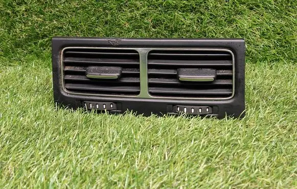 Dash center air vent grill