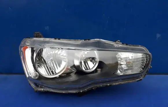 Mitsubishi Lancer VIII Headlight/headlamp P8597
