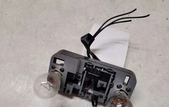 Saab 9-3 Ver2 Tail light bulb cover holder