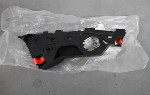 Opel Corsa D Front bumper mounting bracket 13179964 475498858