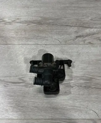 Coolant heater control valve