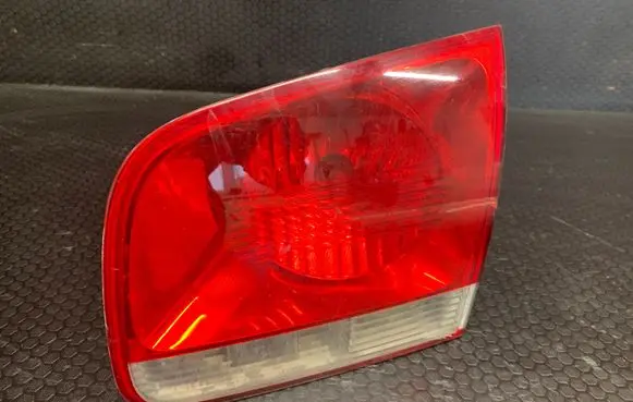 Volkswagen Touareg I Tailgate rear/tail lights 7L6945094H