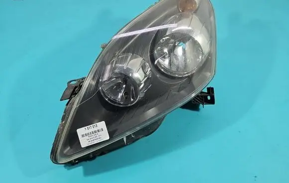 Opel Zafira B Headlight/headlamp 24451052 IMPRK1517013