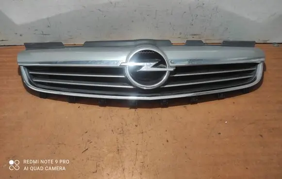 Opel Zafira B Front bumper upper radiator grill 13247327 13247330 13247328