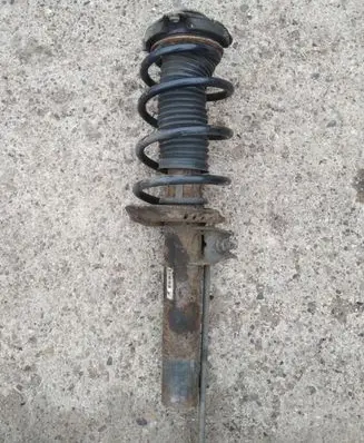 Volkswagen Golf V Front shock absorber with coil spring