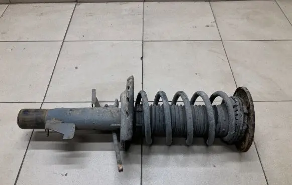 Front shock absorber with coil spring