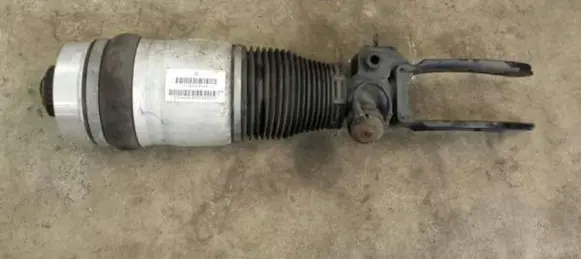 Volkswagen Touareg I Air suspension front shock absorber 7L6616039A