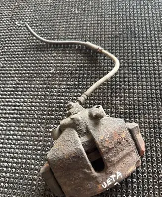 Volkswagen Jetta VI Front brake caliper 1K0615123D