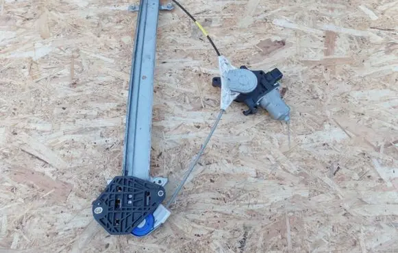 Subaru Legacy Front door window regulator with motor