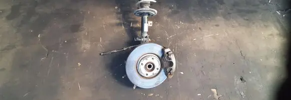 Opel Corsa F Front wheel hub spindle knuckle 9834850080