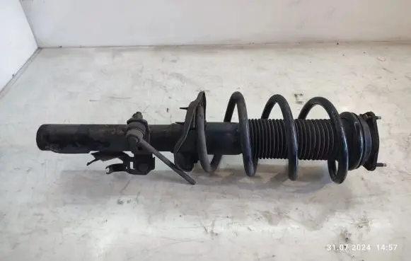 Front shock absorber with coil spring