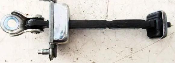 Subaru Outback Front door check strap stopper 
