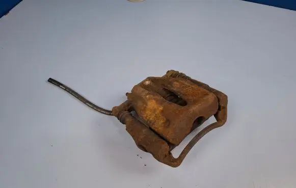 Opel Tigra B Front brake caliper