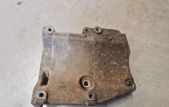 Mitsubishi Pajero Sport I A/C compressor mount bracket 