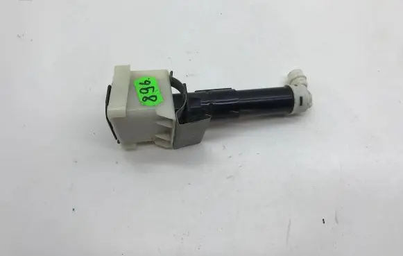 Nissan Leaf I (ZE0) Headlight washer spray nozzle