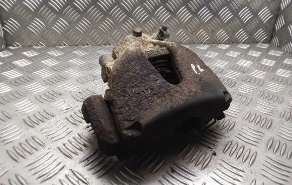 Opel Astra H Front brake caliper 