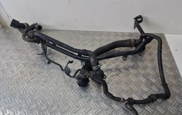 Volkswagen Golf VII Engine coolant pipe/hose 5Q0122157AJ