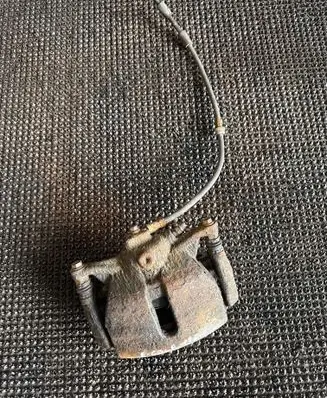 Volkswagen Golf VII Front brake caliper