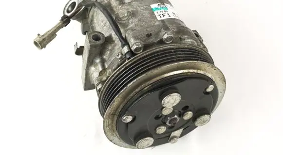 Opel Tigra B Air conditioning (A/C) compressor (pump) 24461719 1447F