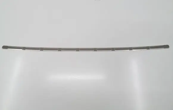 Rear bumper trim bar molding