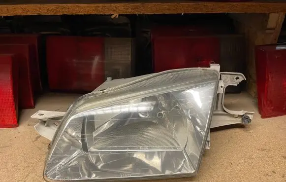 Mazda 323 Headlight/headlamp 1305235392 1305630307