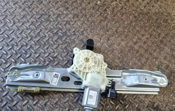 Rear door window regulator with motor