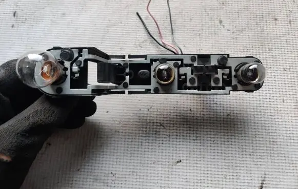 Volvo S70 V70 V70 XC Tail light bulb cover holder 149978