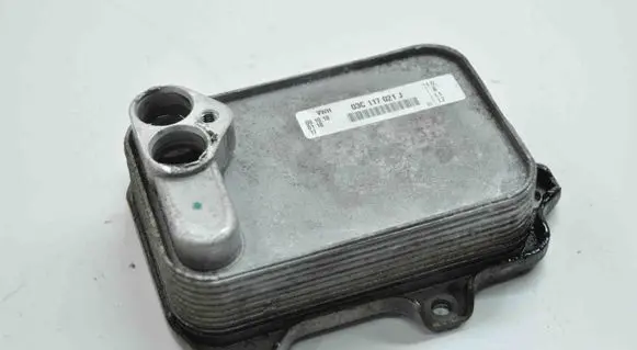 Volkswagen Golf VI Engine oil radiator 03C117021J