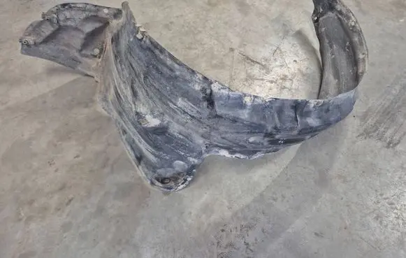 Toyota Hilux (AN10, AN20, AN30) Front wheel arch liner splash guards 538050K050 538750K140