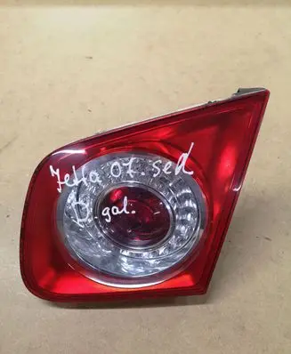 Volkswagen Jetta V Tailgate rear/tail lights 1K5945094 983152