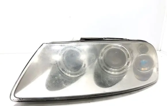 Volkswagen Touareg I Headlight/headlamp 7L6941015BK