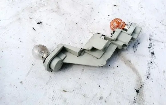 Volvo V50 Tail light bulb cover holder