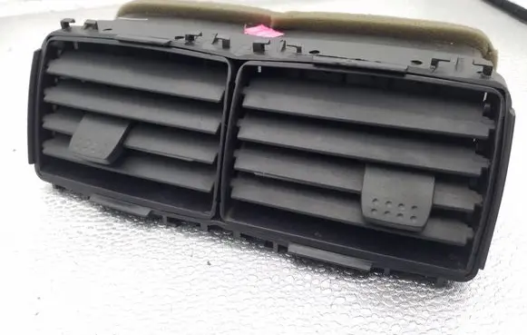 Ford Explorer Dash center air vent grill 6L2419C681A