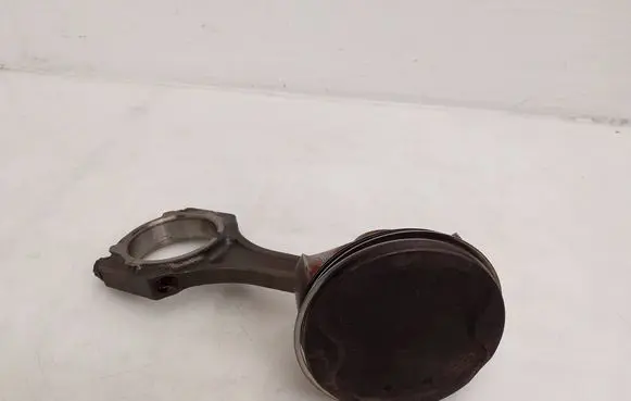 Piston with connecting rod