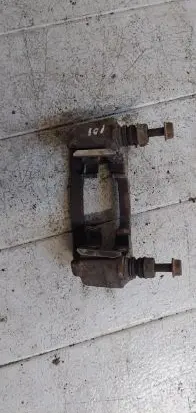Subaru Legacy Brake caliper pad carrier rear 